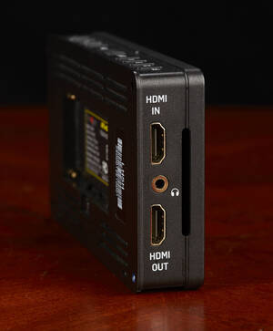 The left side has the HDMI input and output, and a headphone jack.